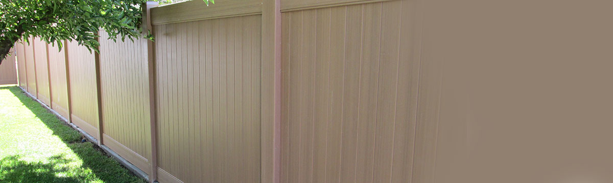 A beautiful wood style vinyl fence